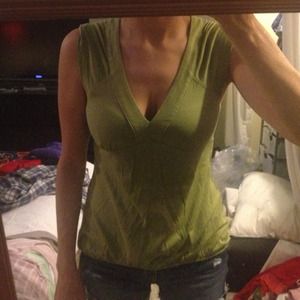 Green sleeveless shirt