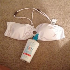 Bundle Brand new bathing suit top and vs lotion.