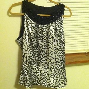 Satin halter top with black beaded neckline