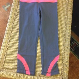 Dark grey crops with coral accents