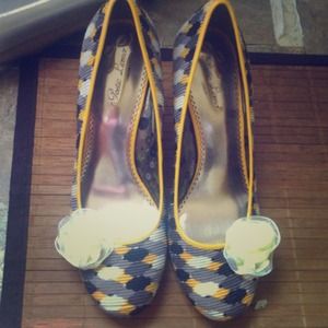 Poetic License Gray, black, and yellow heels