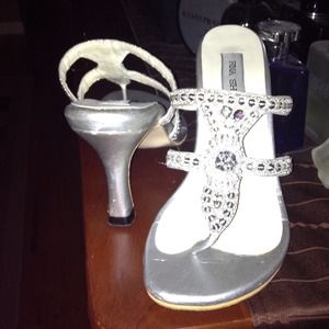 Silver with stone Indian designer shoe.