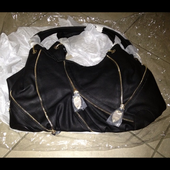 New black purse with gold zipper detail