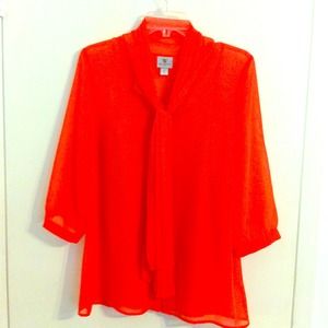 Cute shear top with tank underneath.