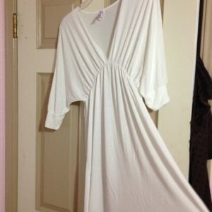 white cotton dress with 3 quarter length sleeves
