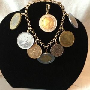 Italian gold bracelet. And Lira pendant.