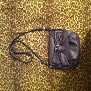 Cute Jessica Simpson over the shoulder handbag.