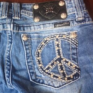 Miss me jeans! Destroyed, peace sign pockets