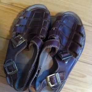 Doc Martens sandals.