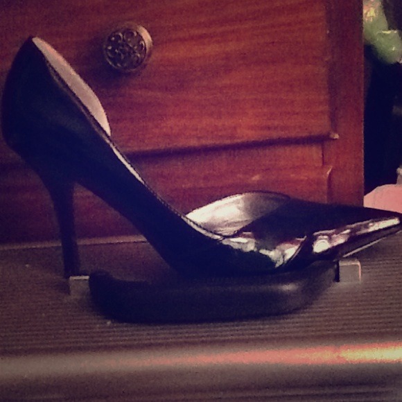 A pair of black Pantone leather heels.