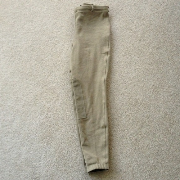 Tan riding pants, with knee patches