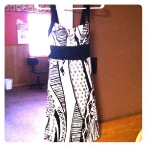 Elegant yet sophisticated 1in above the knee dress