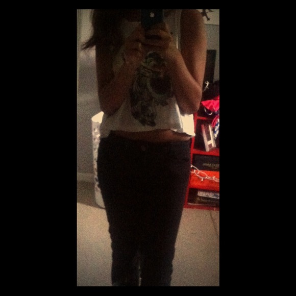 Black pants and top.