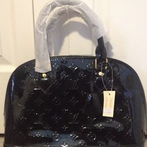 **Sold**Black Patent Leather Handbag
