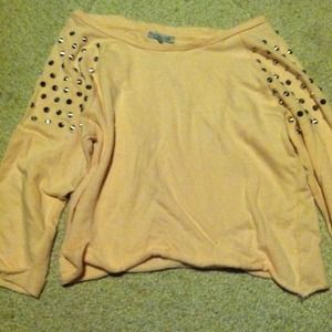 Pink sweater itch studs on the shoulders