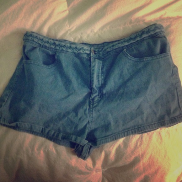 Blue high wasted shorts with beaded waste.
