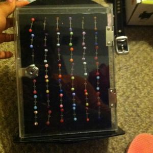 Tongue rings along with display