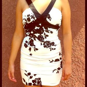 white dress with black flower print & v neckline
