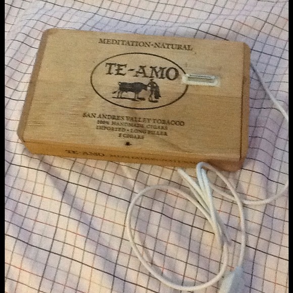 Vintage iPhone charger, pretend to like cigars