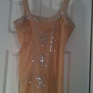 Miss Me peach top with sequin accents.