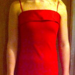 Red floor length dress.