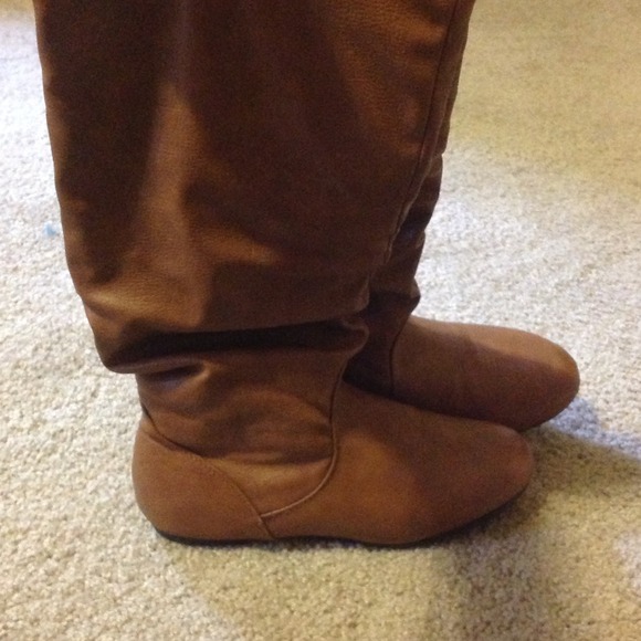 Calf high brown Charlotte Russe boots