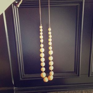 Golden yellow large-beaded necklace.