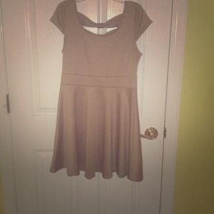 A beige dress great for any occasion!