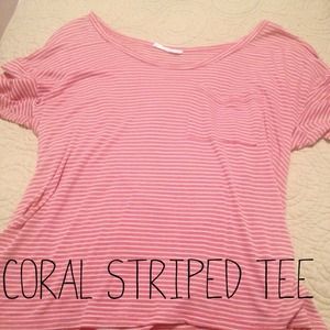 Coral and white striped t shirt.