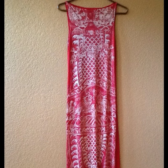 Never been worn.  Awesome Vivienne Tam dress!