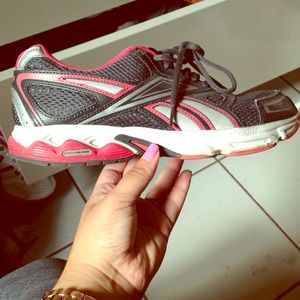 Pink and grey reebok shoes