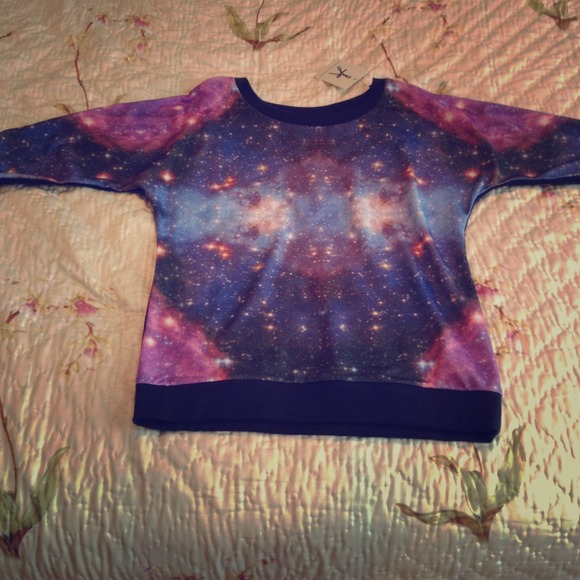 Galaxy sweater. Never worn.