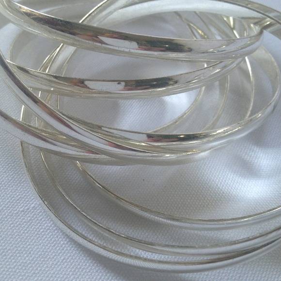 9 Silver Entwined Eternity Bangles - Picture 2 of 3