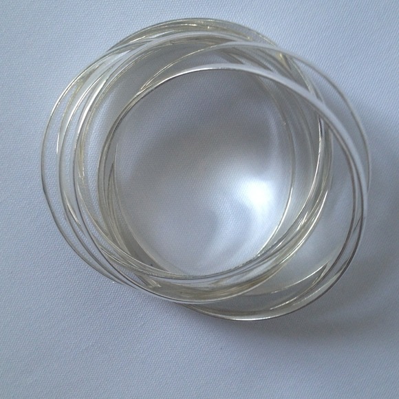 9 Silver Entwined Eternity Bangles - Picture 3 of 3
