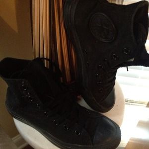 High top black on black All Star Converses