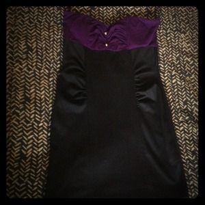 A tight black purple dress