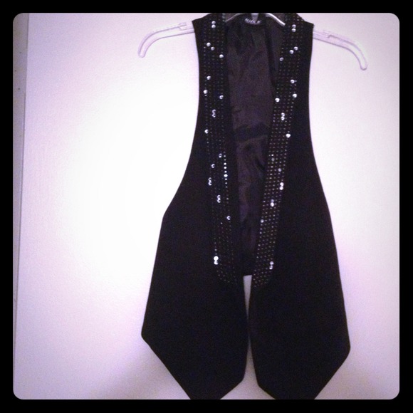 Allen B Crystal embezzled Vest