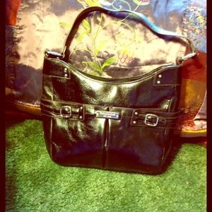Classic black leather Etienne Aigner purse.