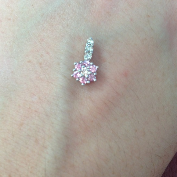 A beautiful diamond and pick sapphire pendent