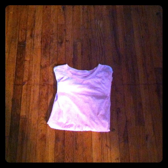 See through light pink shirt.