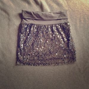 Selena Gomez skirt from and blue sparkle wallet!!