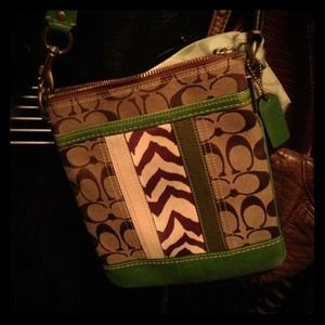 Authentic Coach swingpack w/ zebra & green stripes