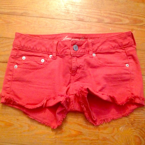 Dark coral cutoffs