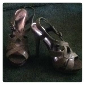 Gray snakeskin print pumps.