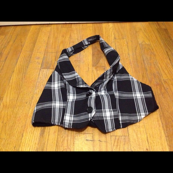 Black and white plaid vest/ a lace tie in the back