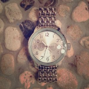 Silver colored watch - for a man or women