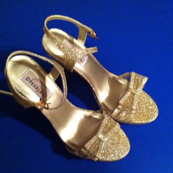 Gold glitter heels.