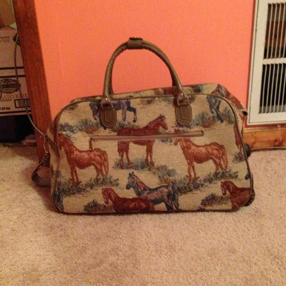Vintage horse covered luggage