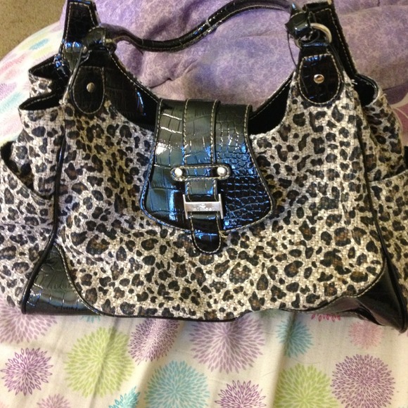 A super cute cheetah print purse!!! Barely used!!