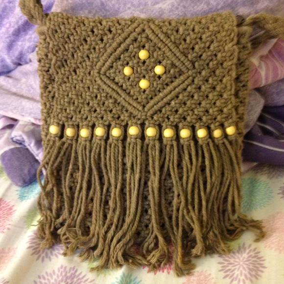 A beautifully brown beaded and hand designed bag.